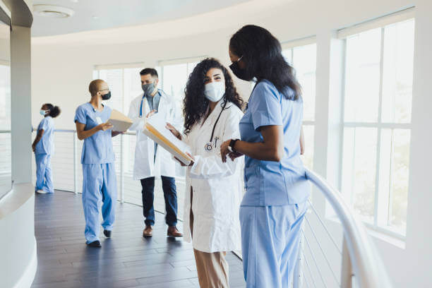 medical providers in a hospital lobby